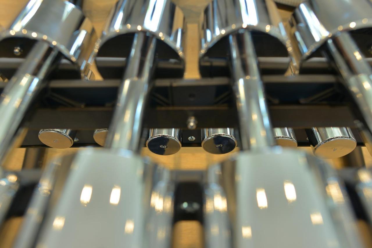 mk hotel tirana Rinas Bagian luar foto The pipes of a pipe organ