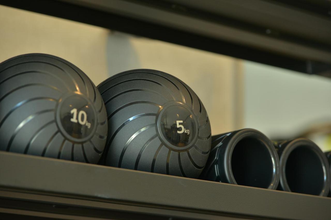 mk hotel tirana Rinas Bagian luar foto A set of kettlebells