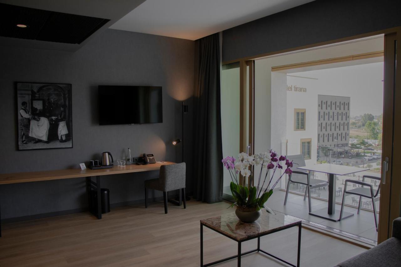 mk hotel tirana Rinas Bagian luar foto A room at the hotel