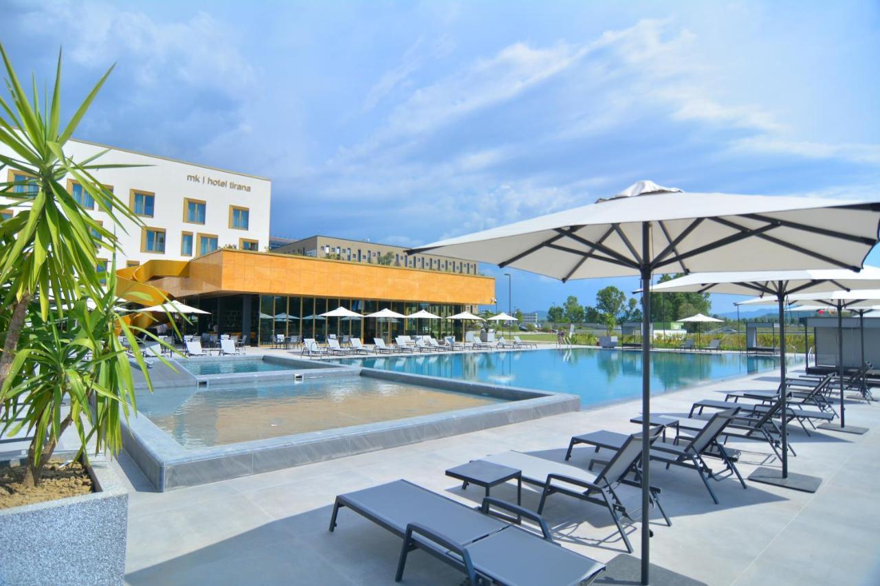 mk hotel tirana Rinas Bagian luar foto The swimming pool at the hotel
