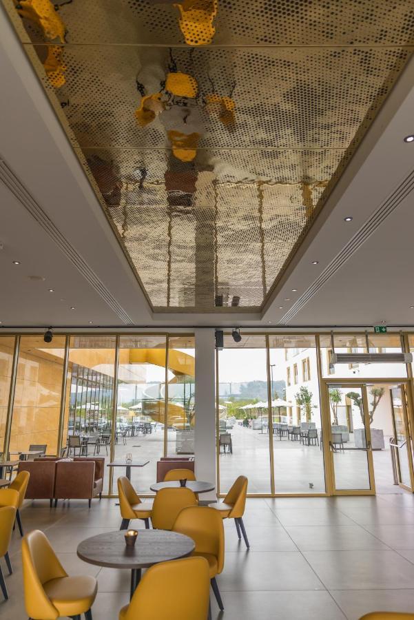 mk hotel tirana Rinas Bagian luar foto The ceiling of the lobby