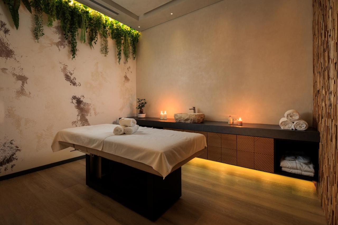 mk hotel tirana Rinas Bagian luar foto A massage table