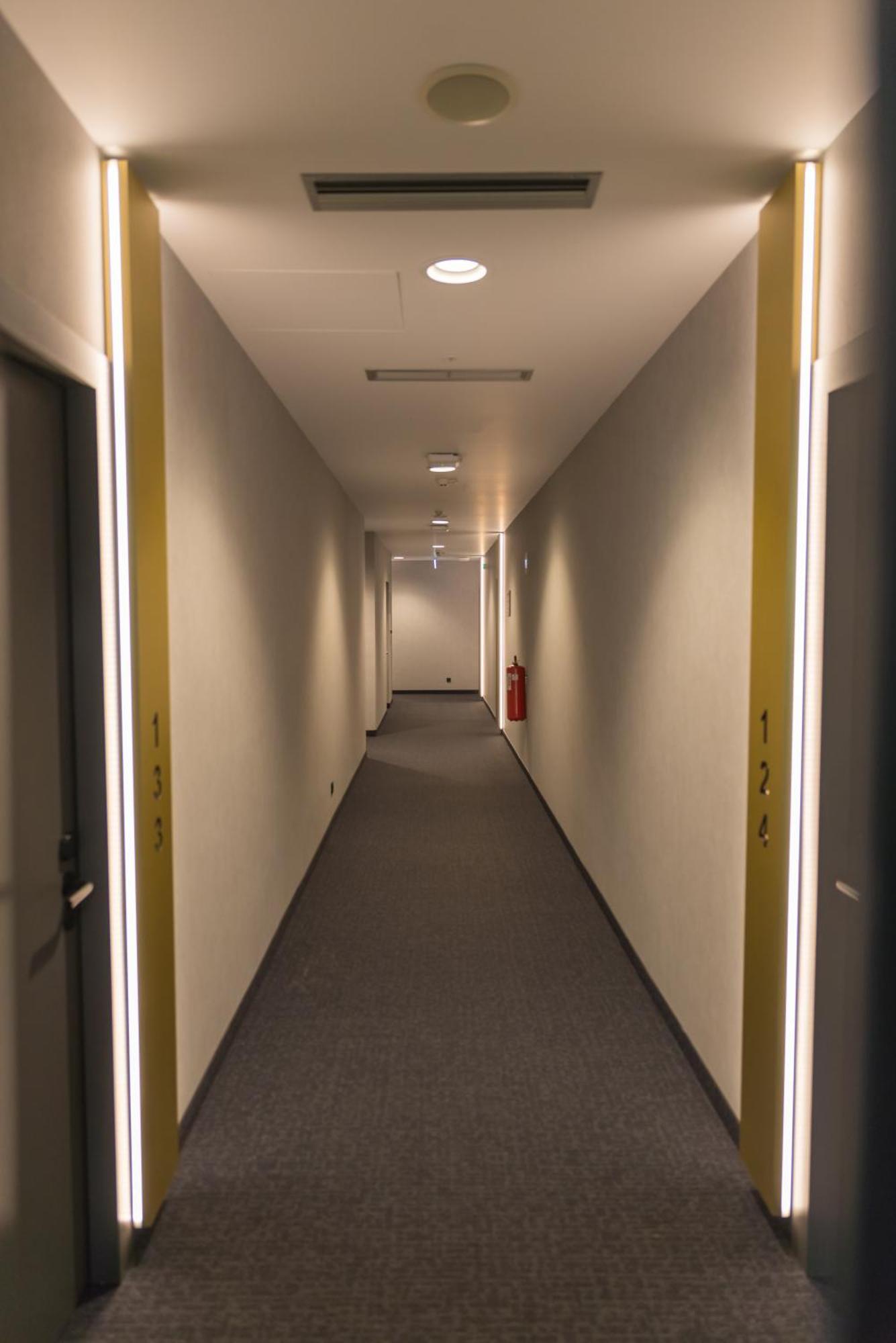 mk hotel tirana Rinas Bagian luar foto A corridor in the new building